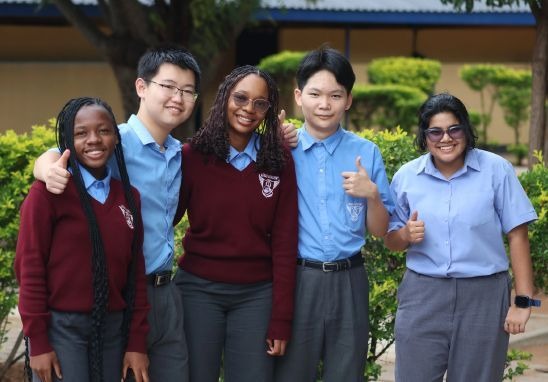 A group of students together on campus